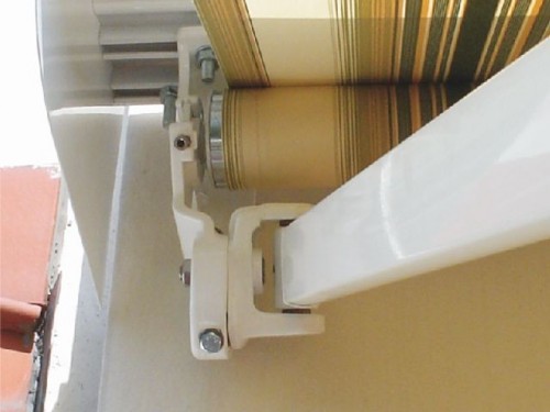 Uchwyt montażowy, ramienia i rury nawojowej zintegrowany w jednym elemencie